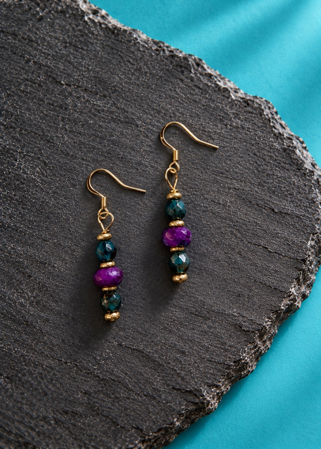 Complimentary earrings included with each Gilded Garden order