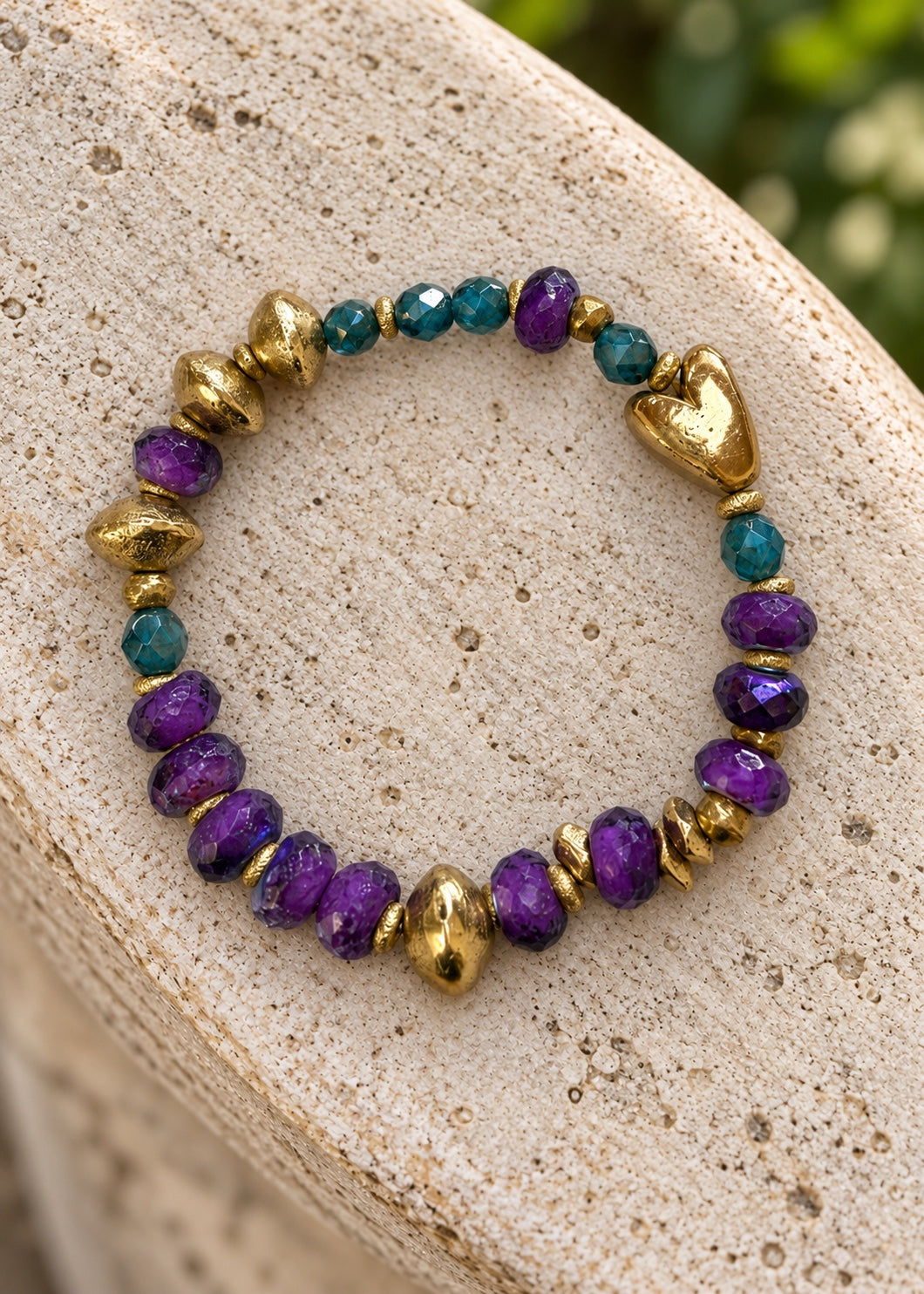 Heart of Gold bracelet on light stone