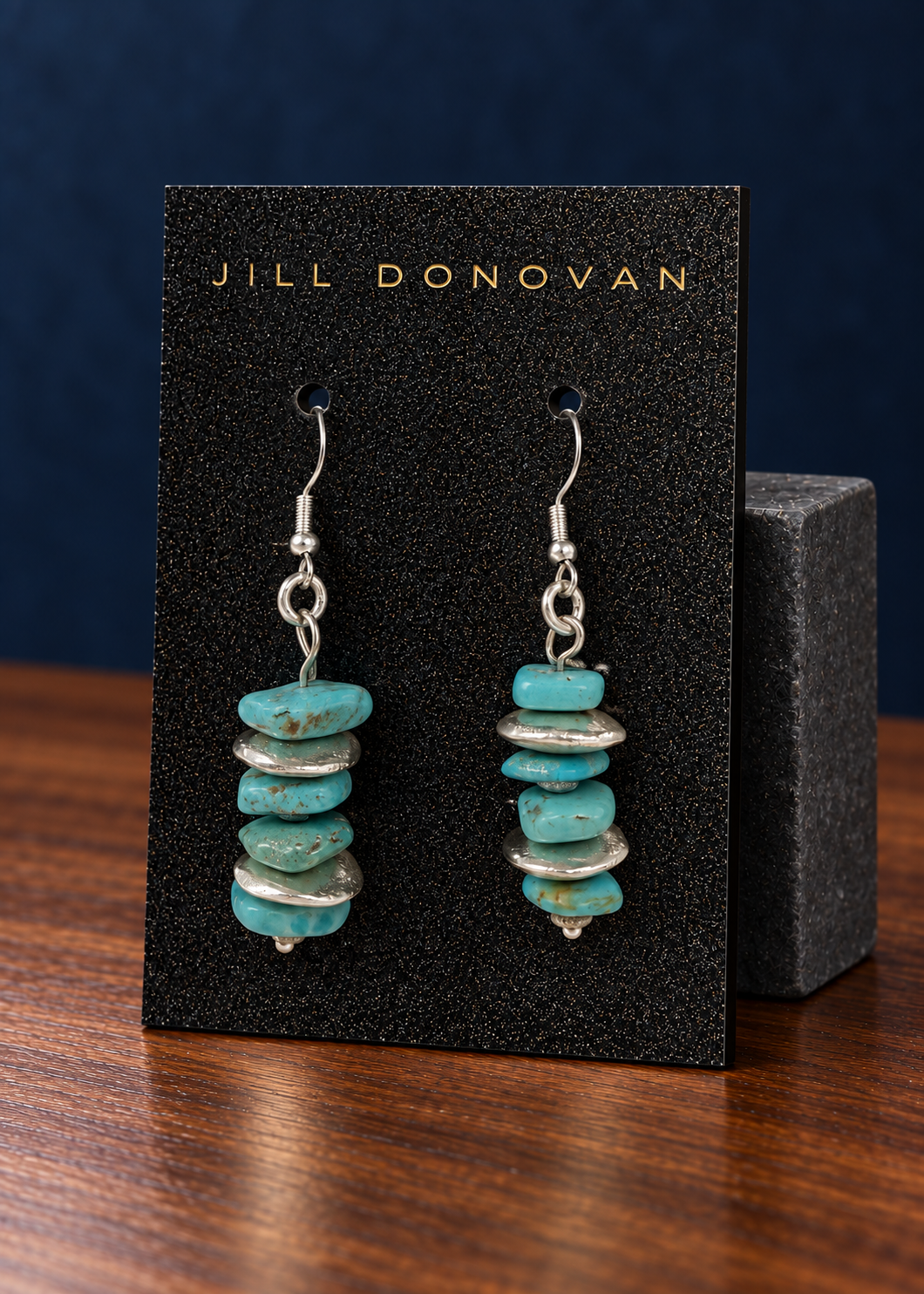 Genuine Turquoise Disc Earrings on a Jill Donovan lucite card