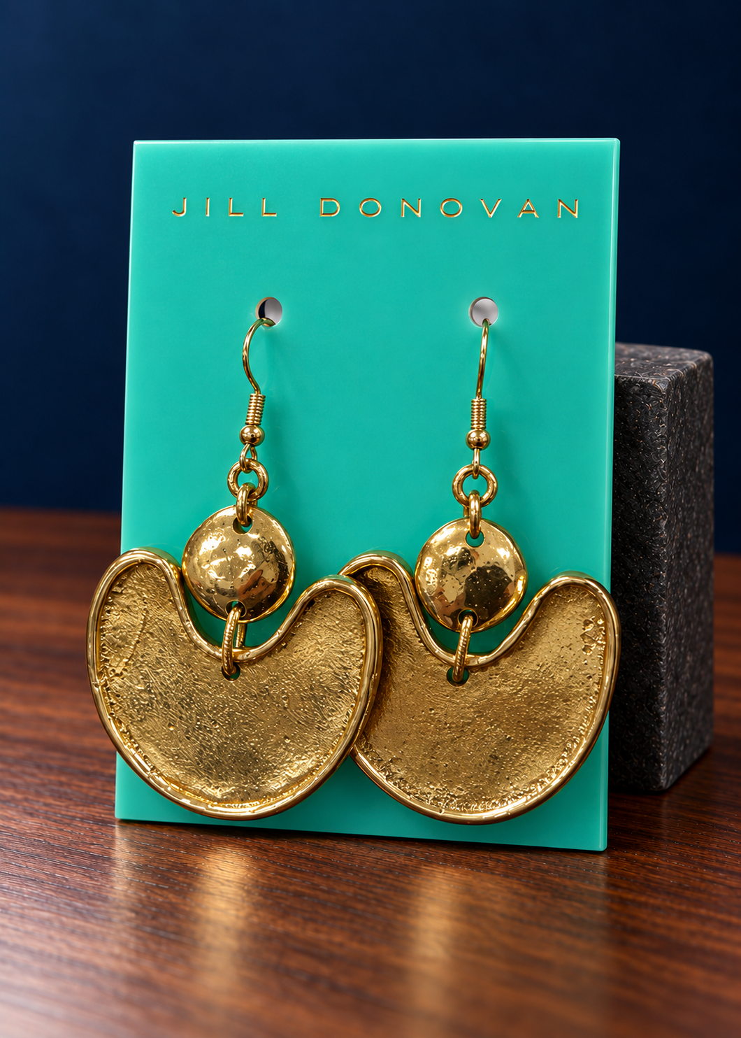 Golden Crescent Drop Earrings on a Jill Donovan lucite card