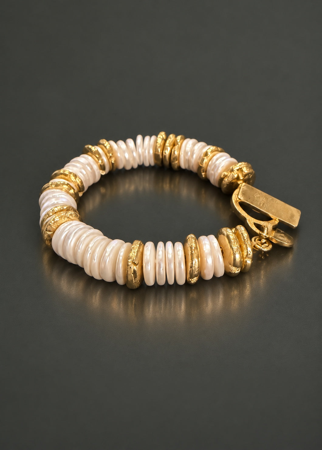 In Good Company shell pearl and cast brass disc bracelet, angled view