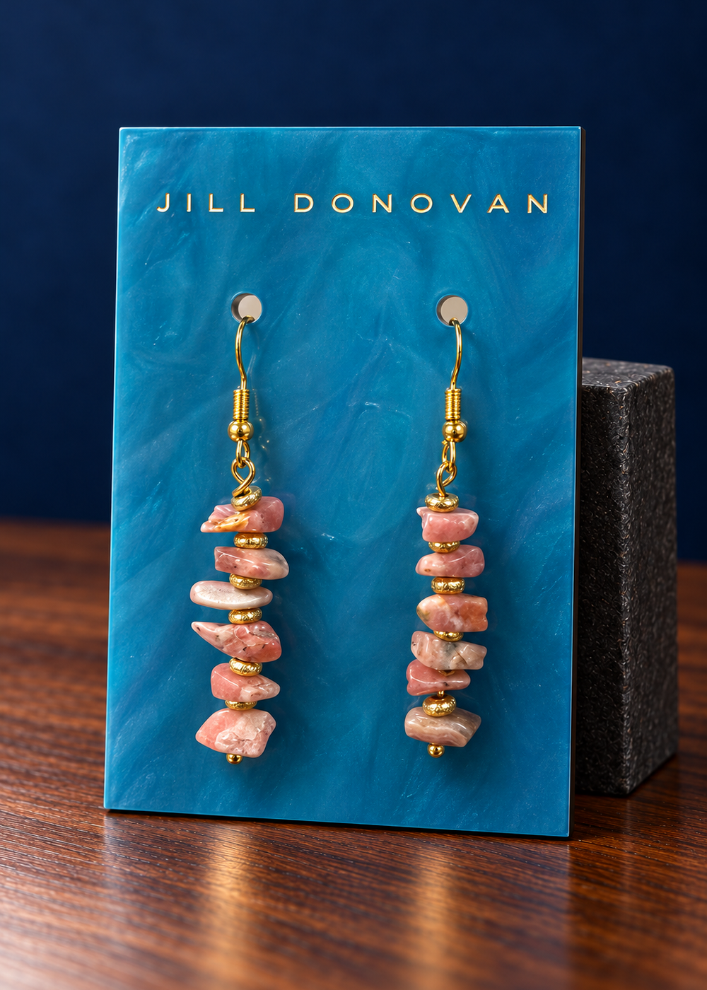 Rhodochrosite Drop Earrings — Gold on a Jill Donovan lucite card