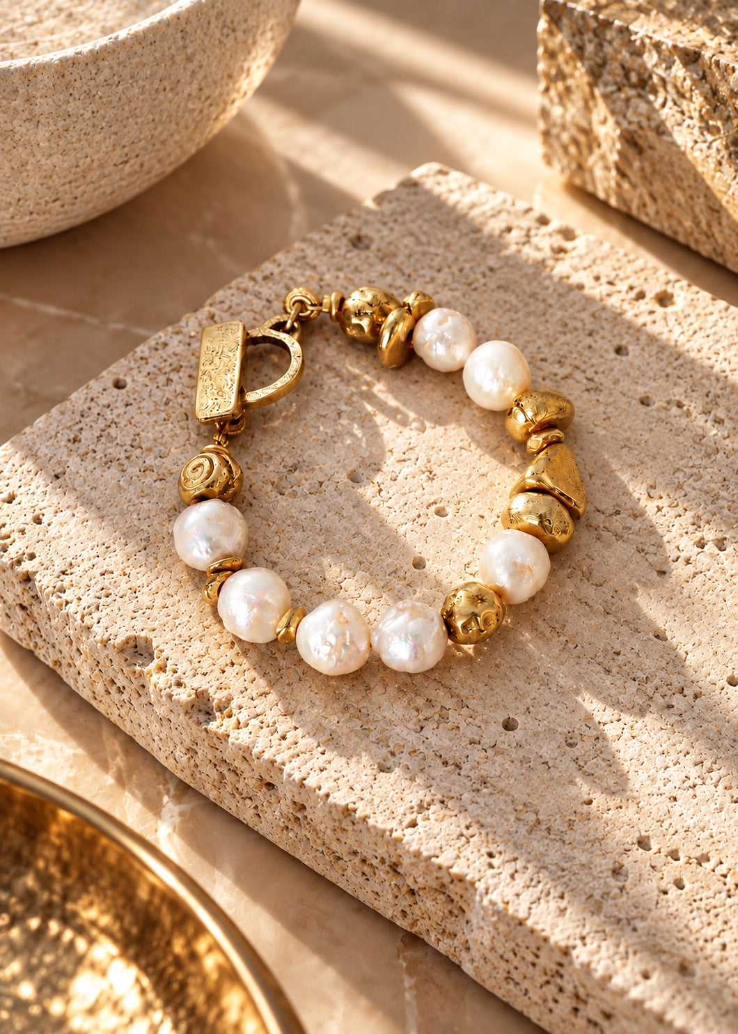 Poetic Pearl By Design bracelet styled on stone
